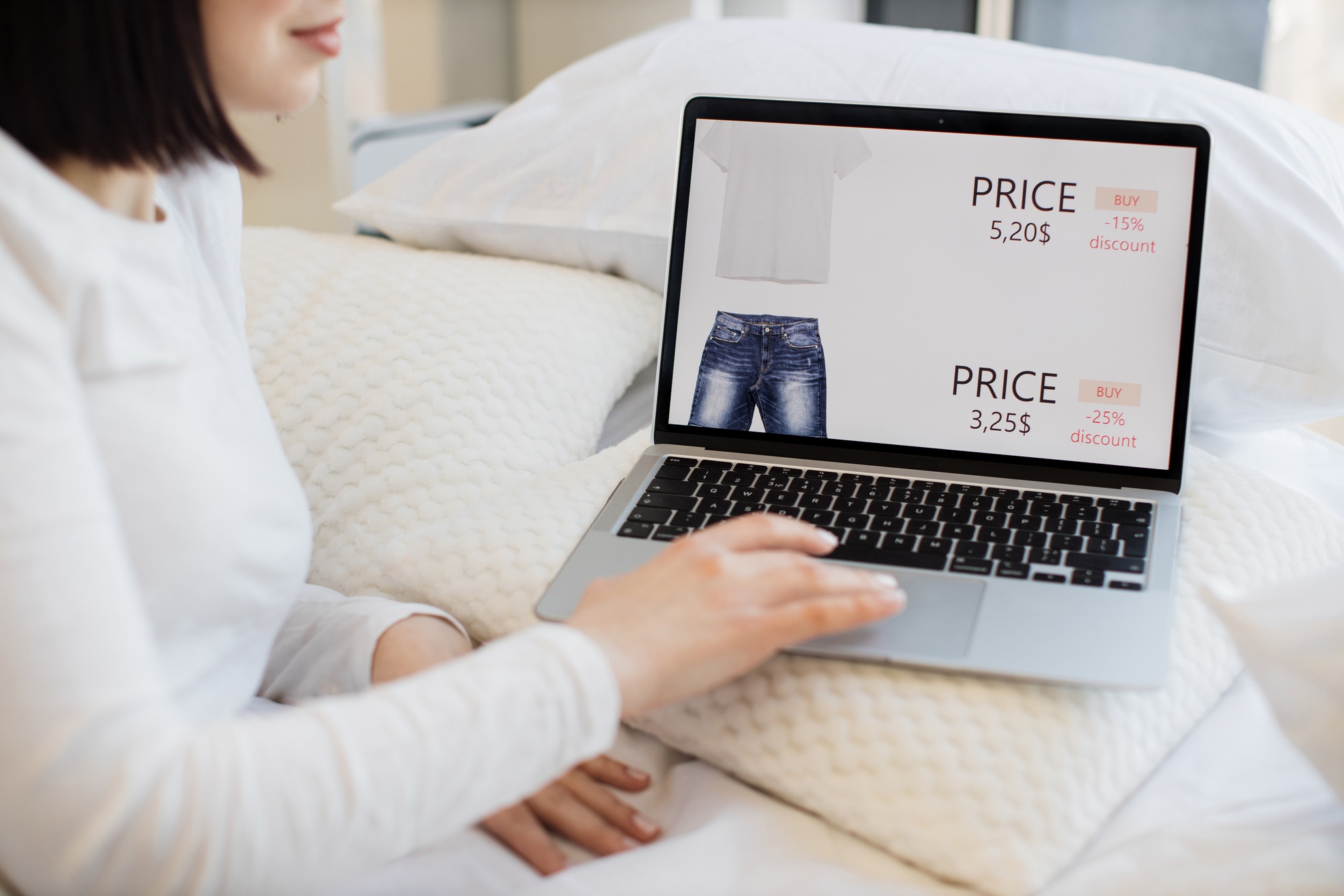 Woman using laptop for browsing shopping site during sale
